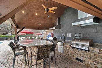 The arbors at breckinridge apartment homes outdoor kitchen and bbq area